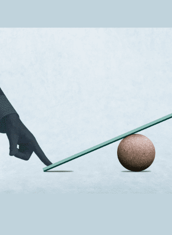 Finger pushing down on a seesaw