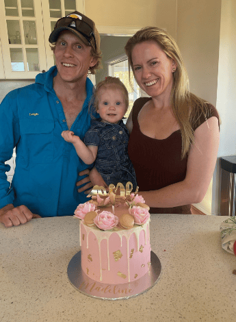 Leigh Miller with his wife Steph and daughter Madeline on her first birthday.