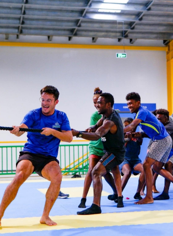 Johnny Mulherin takes the lead in a tug-of-war rope challenge at the Solomon Islands National Institute of Sport. Photo: Solomon Islands National Institute of Sport.