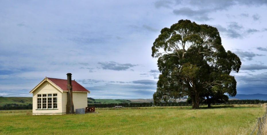 Rural building and tree in the Australian landscape.