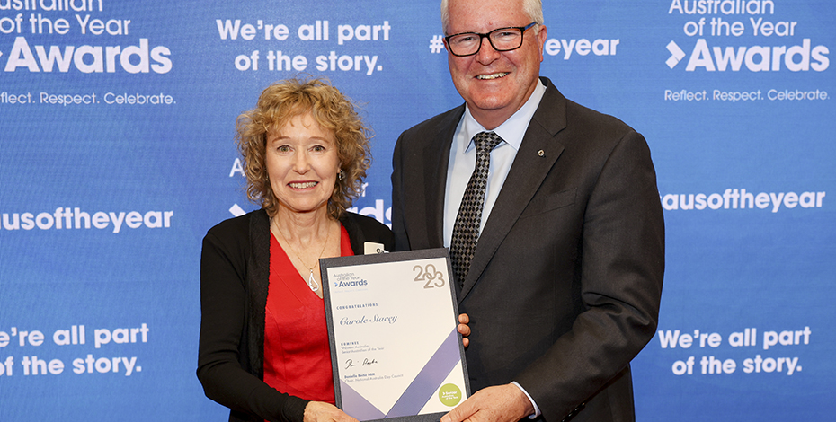 Carole Stacey stands next to the Governor of the state of Western Australia.