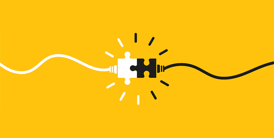 Matching ends of a power cord connect, set on a yellow background as bright as the sun.