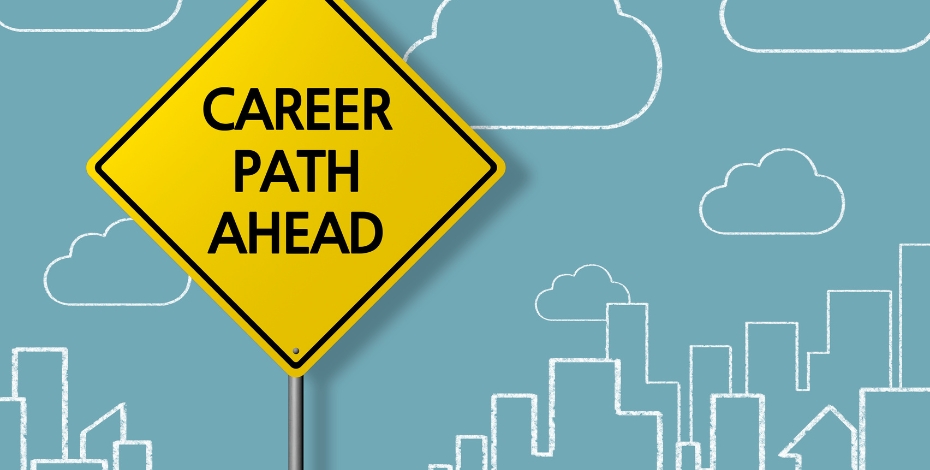 Yellow sign reads career path ahead with a blue background with chalk drawings of buildings
