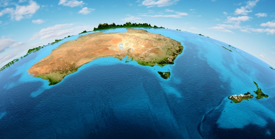 The image shows the curve of the globe against a cloudy sky. Australia is at the top of the globe and New Zealand is on the bottom right. 