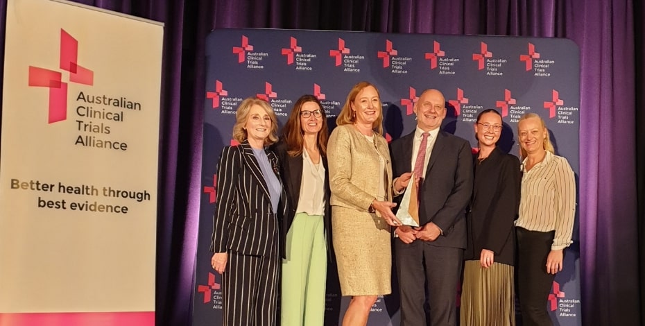 The TEAM Trial team accept the 2023 Australian Clinical Trials Alliance Trial of the Year Award (photo supplied). From left to right: Lisa Higgins and Tessa Broadley (TEAM Management Committee), Professor Carol Hodgson, Professor Steve Webb (Chair of ACTA), and Michelle Paton (TEAM physiotherapist at Monash Health).