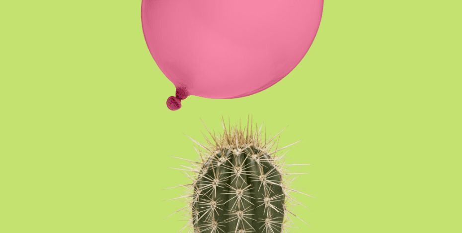 A balloon drifts slowly downwards towards the spikes of a very nasty looking cactus.