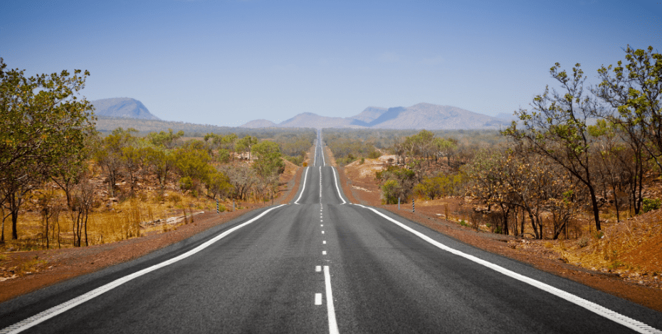 An empty road through the Australian outback. 