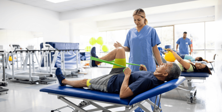 People on tables receiving treatment from physios for their knees