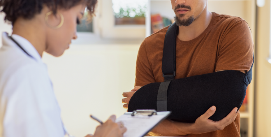 A woman filling out a form about a workplace injury