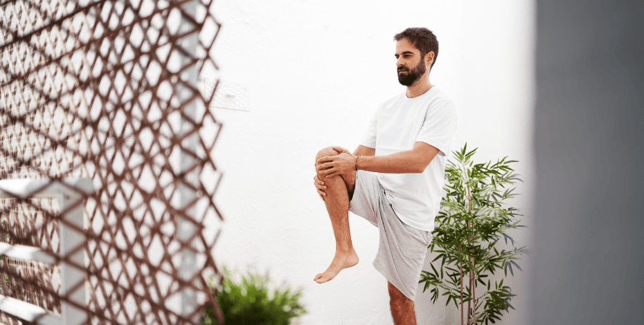 A man exercises his knee as if being prescribed exercise for knee OA.