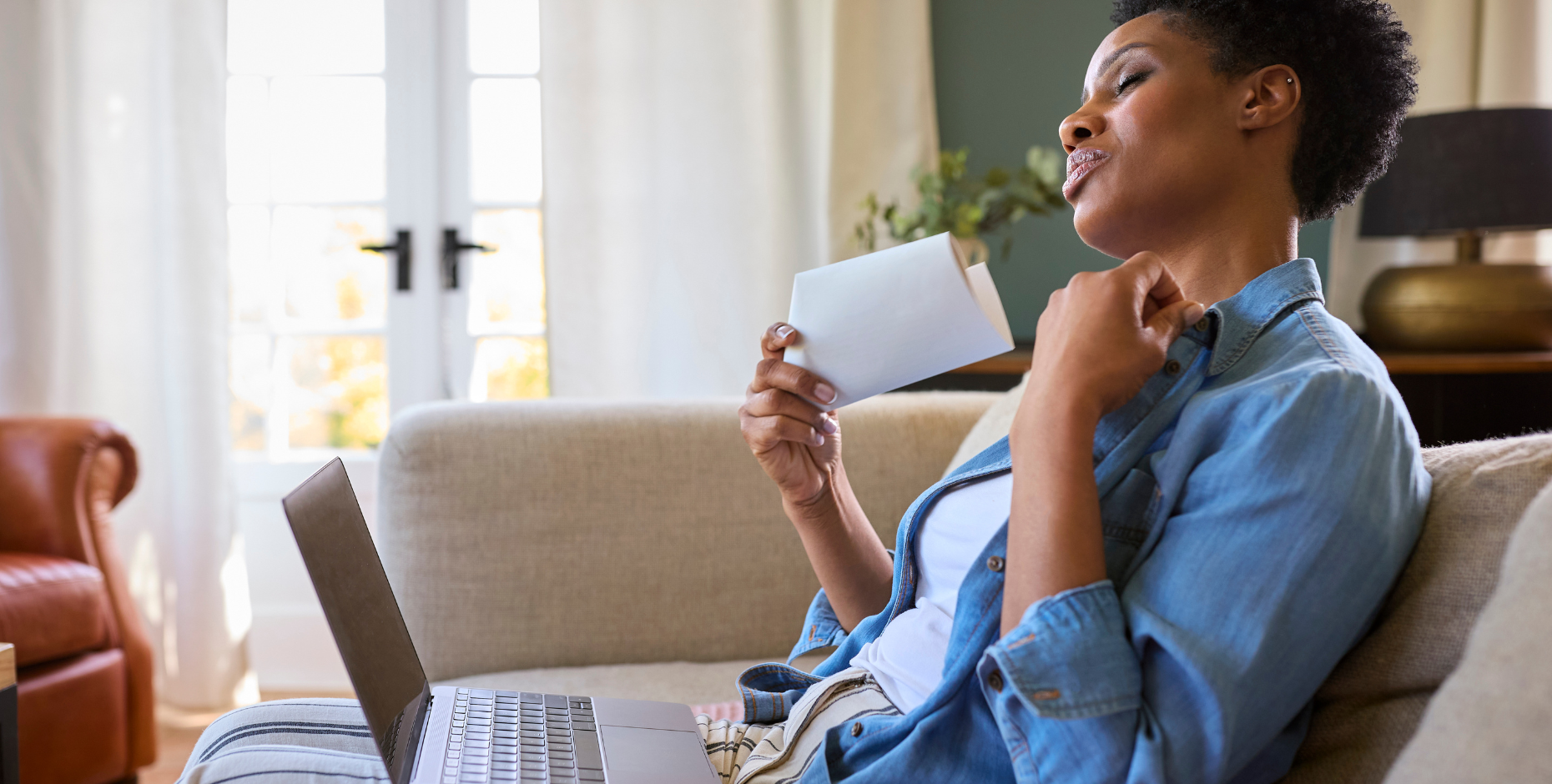 Woman experiencing the symptoms of menopause