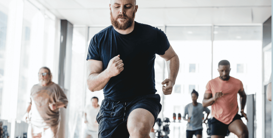 Men exercising in a class.