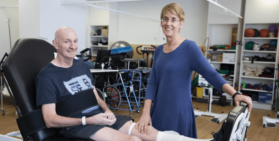 Professor Lisa Harvey with a patient 