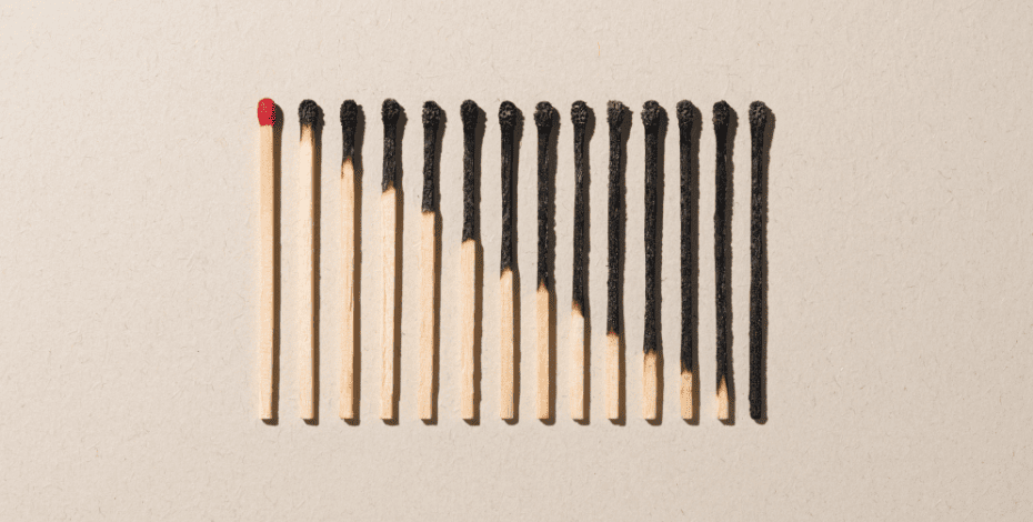 Graphic of matchsticks representing burnout.