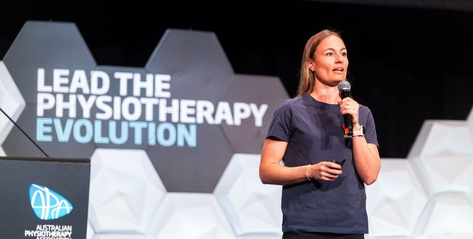 The image is of Plasticise co-founder and physiotherapist Sarah Turner presenting at Physio Pitchfest