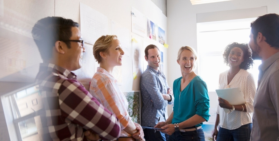 Employees laughing together