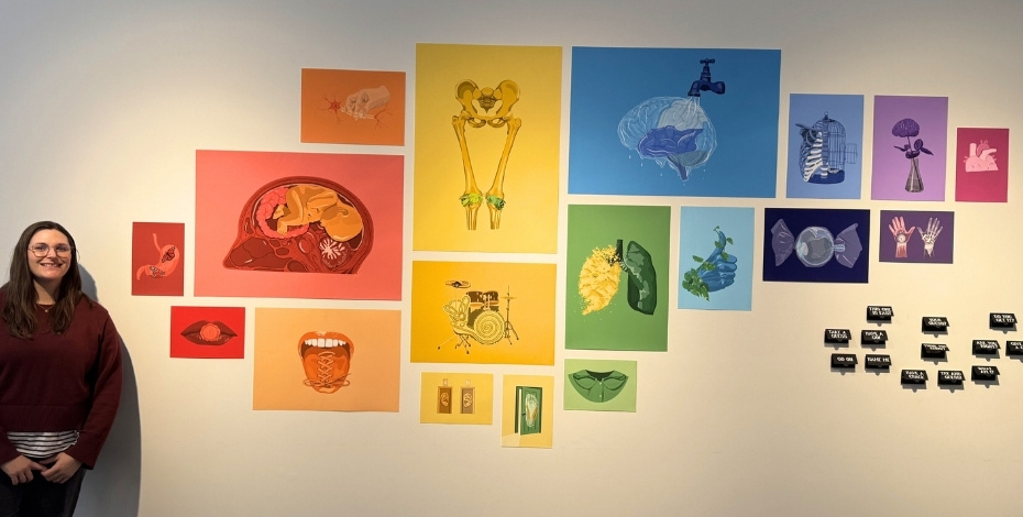Physiotherapist and artist Georgia Pope with some of her many wonderful anatomy art pieces.