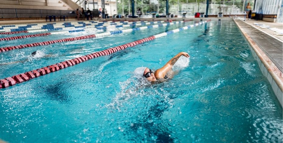 A person doing laps in a pool