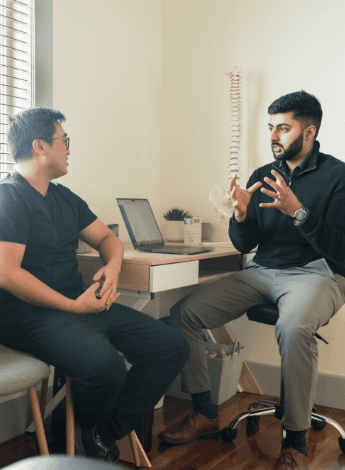 A physio chats with a patient