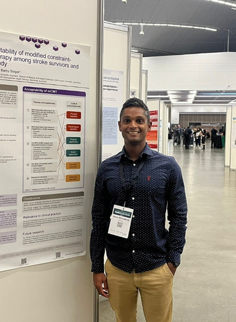 Ashan in front of his poster presentation at the World Congress of Neuro Rehab in Vancouver 2024.