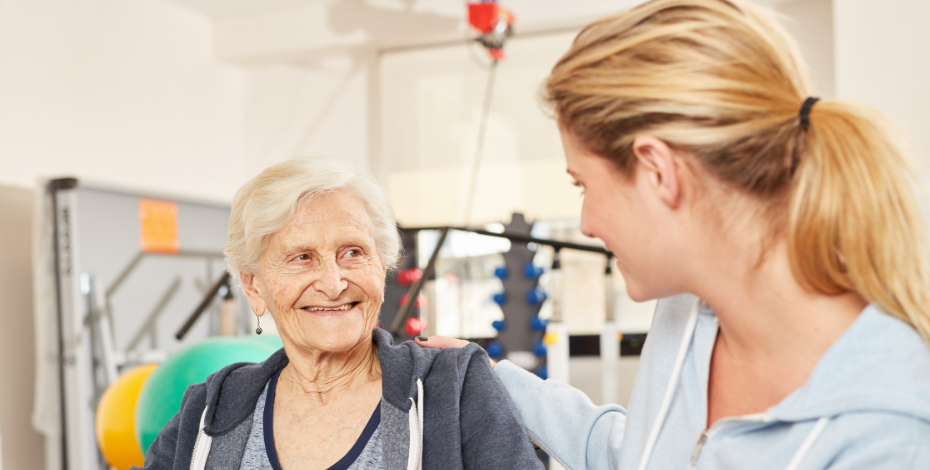 Elderly woman and physio