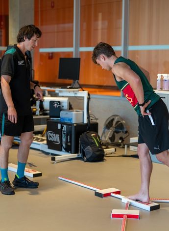 Physiotherapy students working alongside exercise and sport science students with the Tasmania Football Club’s Devils Academy.