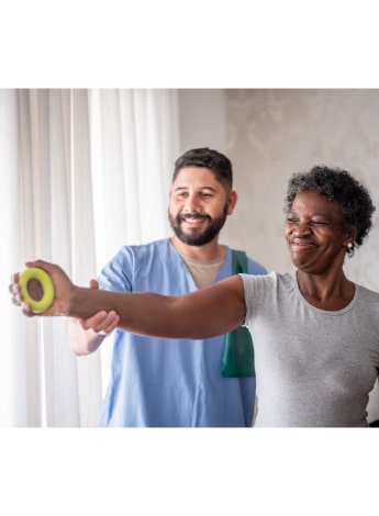 "physiotherapist working with a patient"