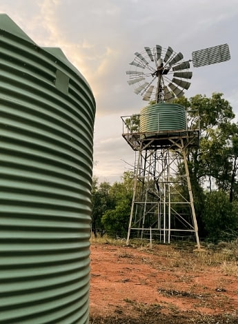 A water tank in a rural landscape.